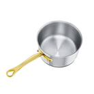 Mauviel M'COOK B sauce pan with brass handles, stainless steel cookware for simmering and sauces in a modern kitchen setting