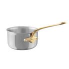 Mauviel M'COOK B sauce pan with brass handles, stainless steel cookware, view of the pan's shiny surface and sturdy handles.