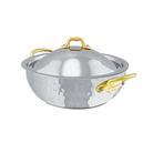 Mauviel M'ELITE B hammered 5-ply curved splayed saute pan with brass handles and lid, showcasing its polished stainless steel finish.