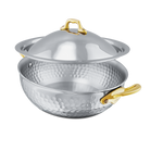 Mauviel M'ELITE B hammered 5-ply curved splayed sauté pan with lid and brass handles, showcasing its polished, durable cookware design.