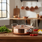 Mauviel M’3 S copper rondeau with lid, cast stainless steel handle, 3.2-quart capacity, ideal for cooking and simmering.