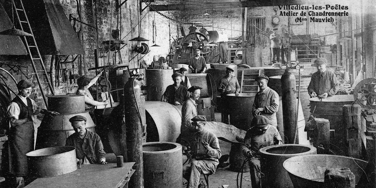 Historic photo of craftsmen in the Mauviel copper workshop