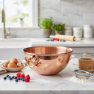 Mauviel M'PASSION egg white beating bowl with ring handle, stainless steel kitchen tool for whipping and mixing ingredients.